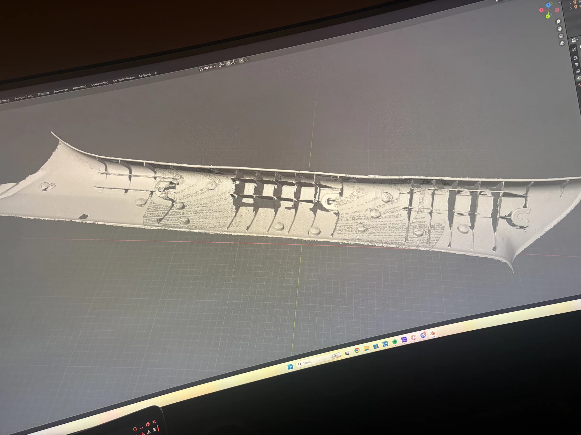 Multiple A-pillar scan sections aligned into one reference mesh in Blender.