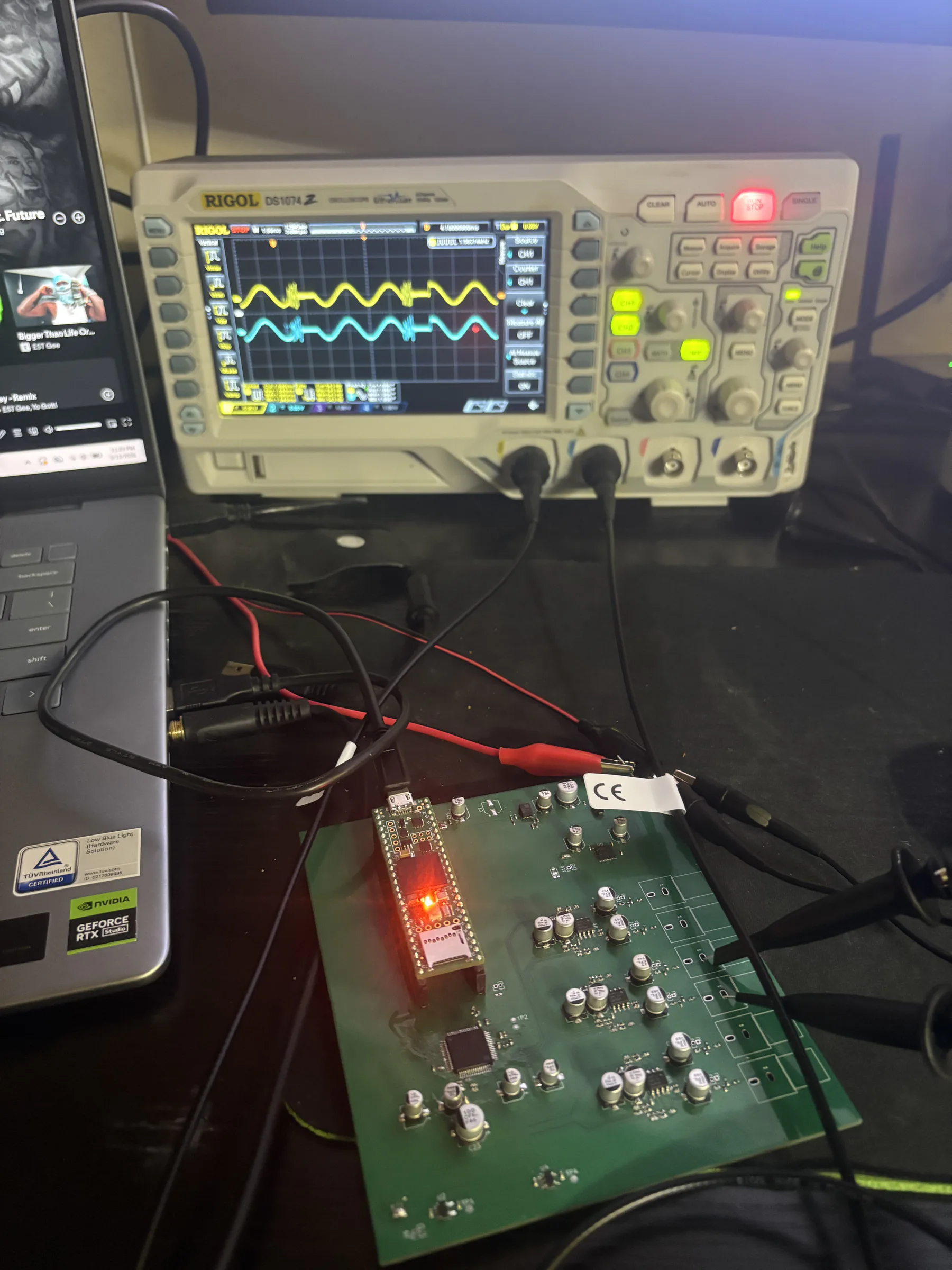 DSP Revision 2 board connected to an oscilloscope on the electronics bench.
