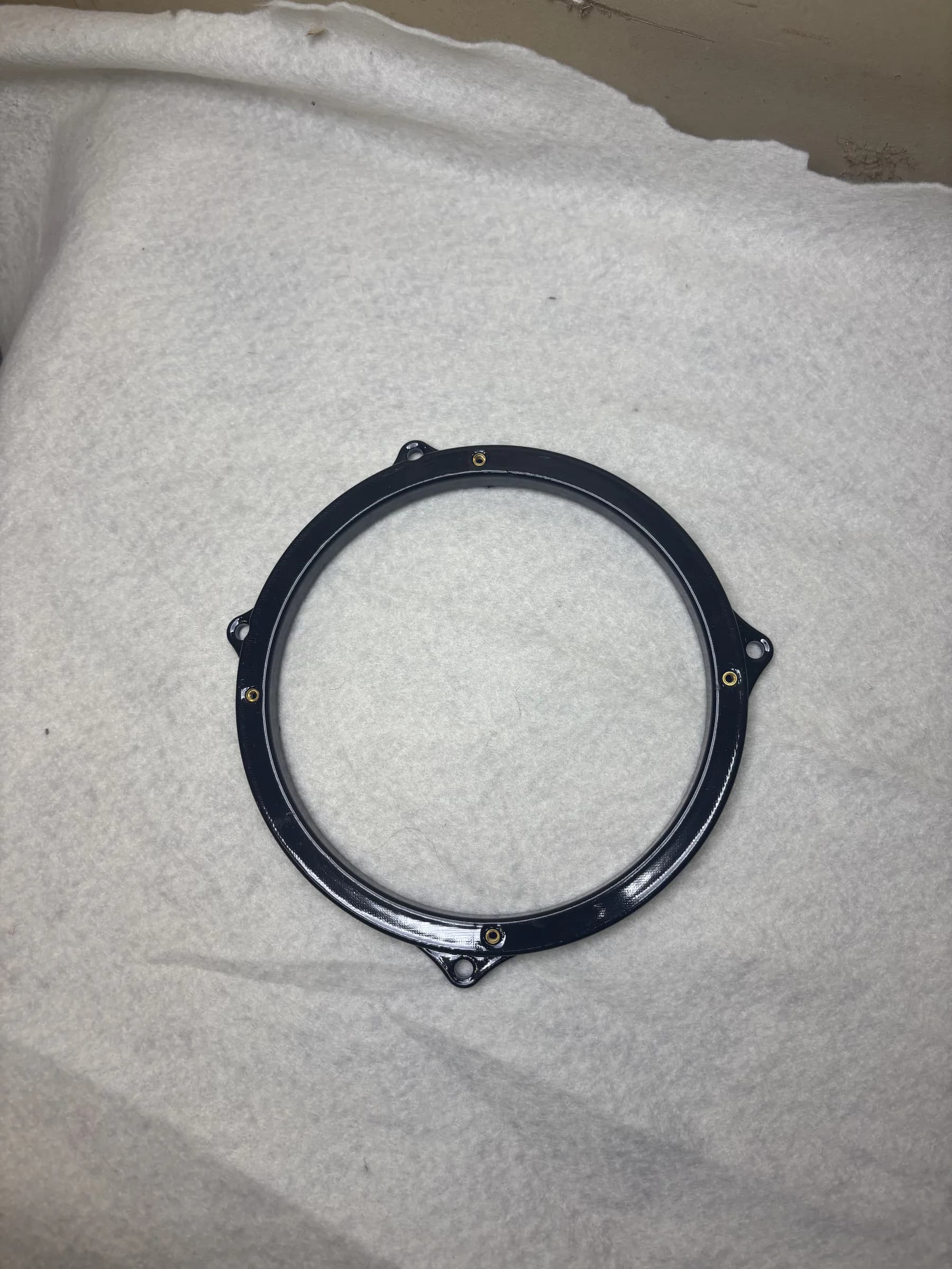 Glossy black ABS 6.5-inch speaker adapter after a vapor-smoothing finish experiment.